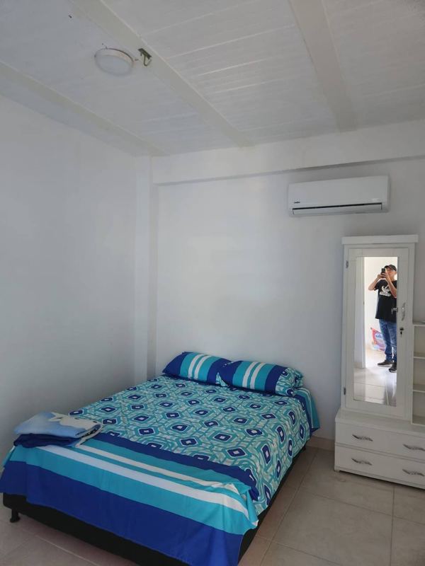 Master bedroom with double bed and air conditioning