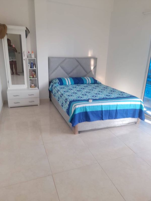 Bedroom with double bed and air conditioning